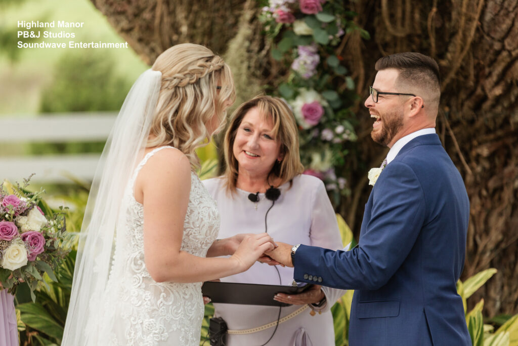 Bride-and-Groom-at-Altar-With-Officiant-Using-Lavaliere-Mic