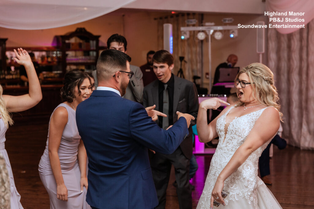 Bride-and-Groom-Dancing-With-Their-Guests